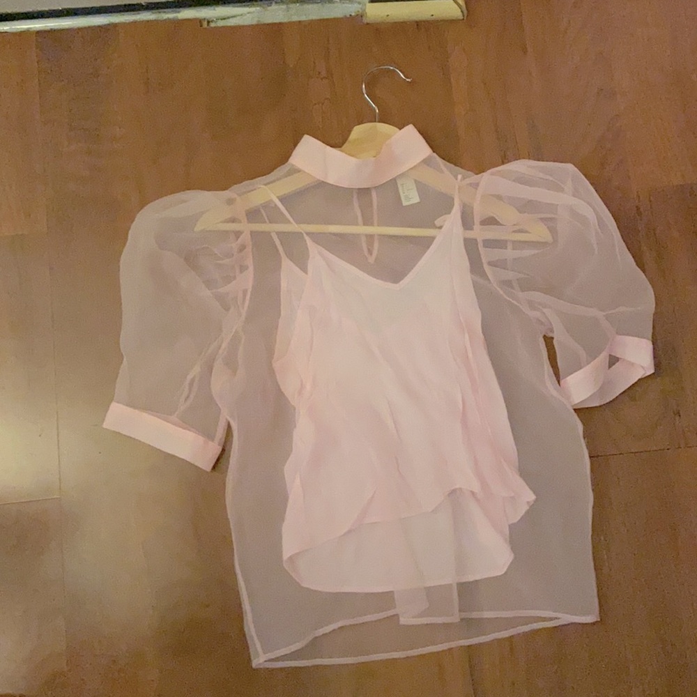 pink sheer blouse with a tank top